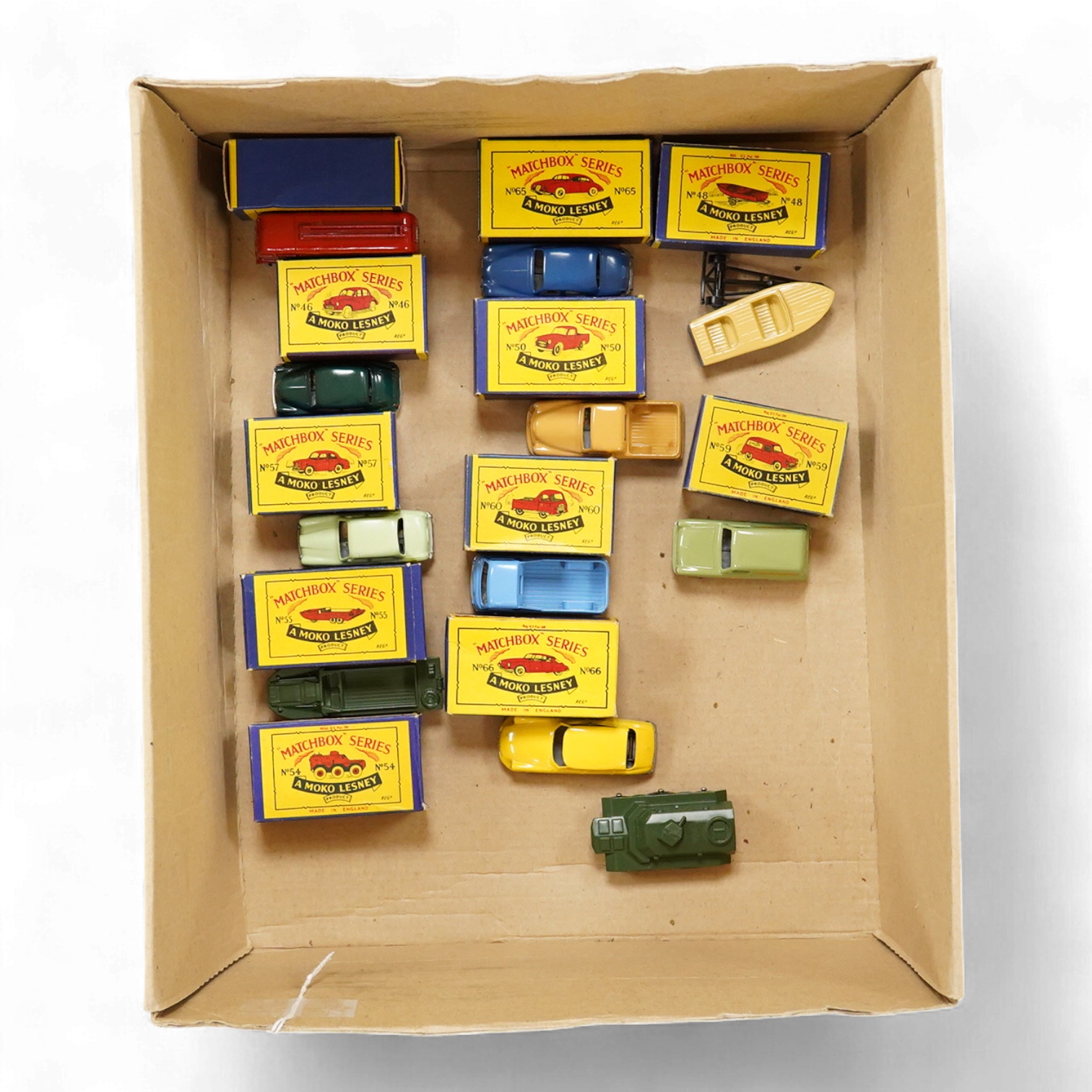 Eleven boxed Matchbox Series 1-75 regular wheels vehicles; 46; Morris Minor, 48; Meteor sports boat and trailer, 50; Commer pick-up truck (creasing to one end of the box), 54; Saracen personnel carrier, 55; DUKW amphibia